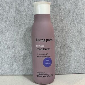 Living Proof Restore Conditioner in Lavender and White